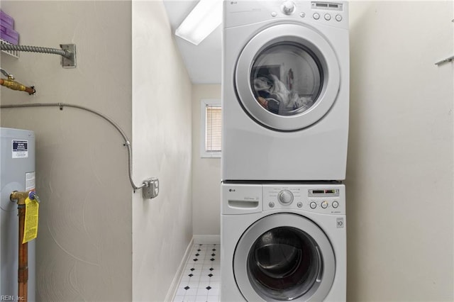 441 Cummings Rd, Virginia Beach, VA 23452 - laundry room featuring stacked washer / dryer, water heater, baseboards, and light floors