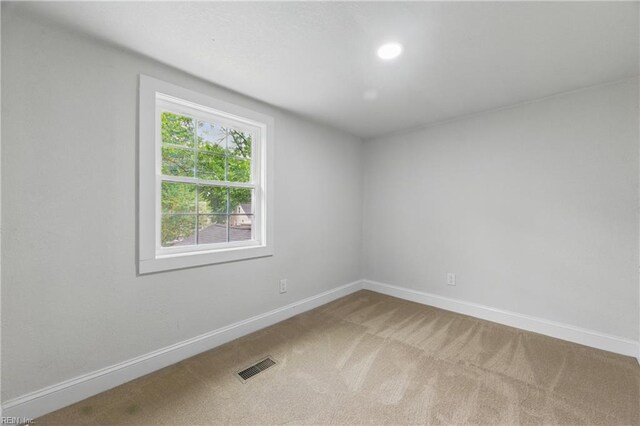 8457 Radnor Rd, Norfolk, VA 23503 - carpeted empty room with baseboards and recessed lighting