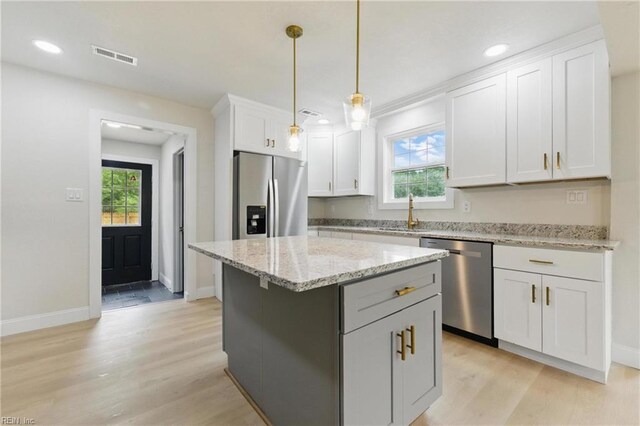 8457 Radnor Rd, Norfolk, VA 23503 - kitchen with appliances with stainless steel finishes, healthy amount of natural light, baseboards, and recessed lighting