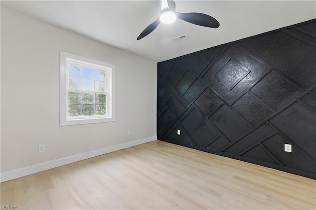 8457 Radnor Rd, Norfolk, VA 23503 - spare room featuring wood finished floors, baseboards, and a ceiling fan