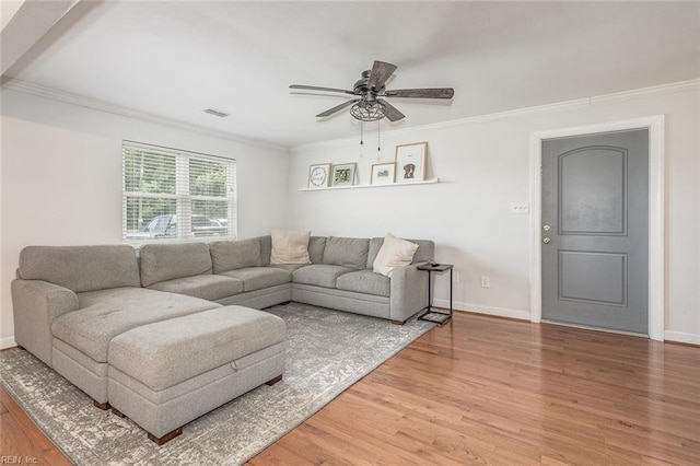 940 Blackwater Rd, Chesapeake, VA 23322 - living room with light wood-style flooring, crown molding, a ceiling fan, and baseboards