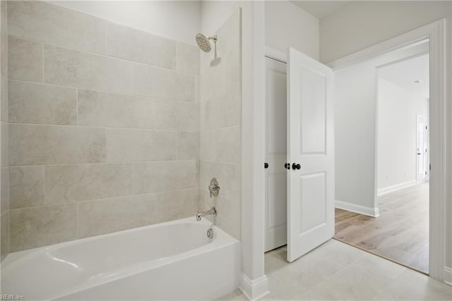 225 Ayrshire Loop, Smithfield, VA 23430 - bathroom featuring shower / tub combination and baseboards