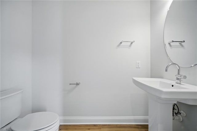 225 Ayrshire Loop, Smithfield, VA 23430 - bathroom with toilet, wood finished floors, and baseboards