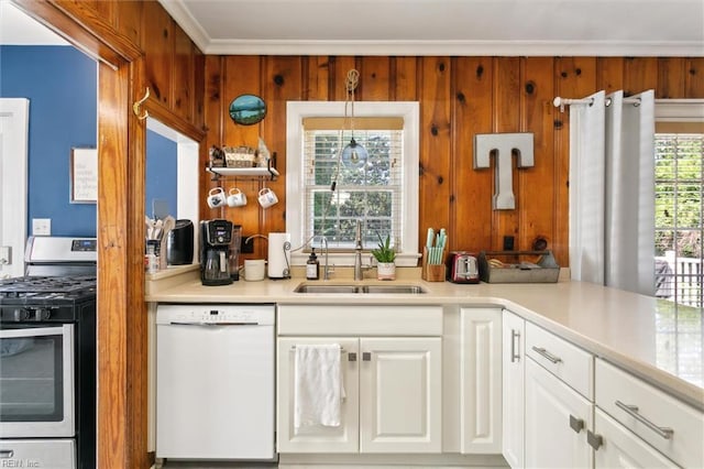 131 Robinson Rd, Hampton, VA 23661 - kitchen featuring white dishwasher, gas range, a sink, light countertops, and white cabinetry