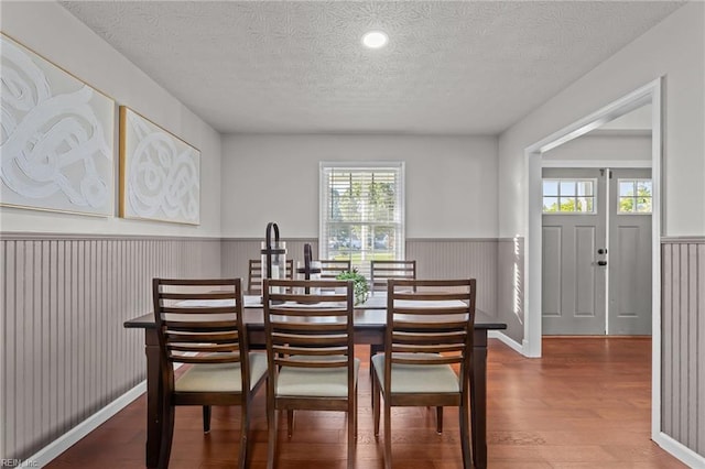 700 Canteberry Ln, Smithfield, VA 23430 - dining room with a textured ceiling, wainscoting, and wood finished floors