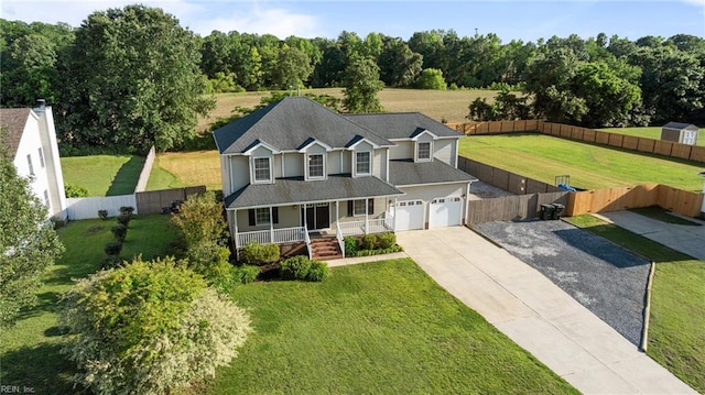 700 Canteberry Ln, Smithfield, VA 23430 - view of front of house with covered porch, driveway, and roof with shingles