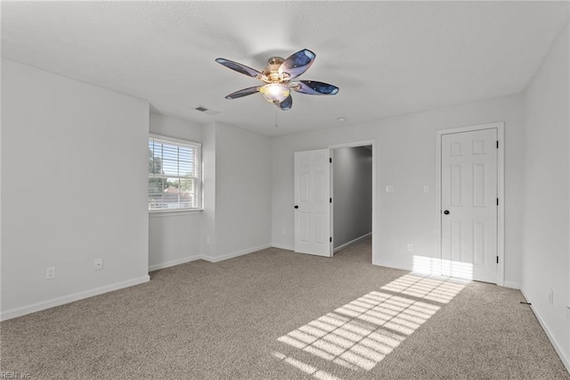 700 Canteberry Ln, Smithfield, VA 23430 - unfurnished bedroom featuring carpet floors, baseboards, and ceiling fan