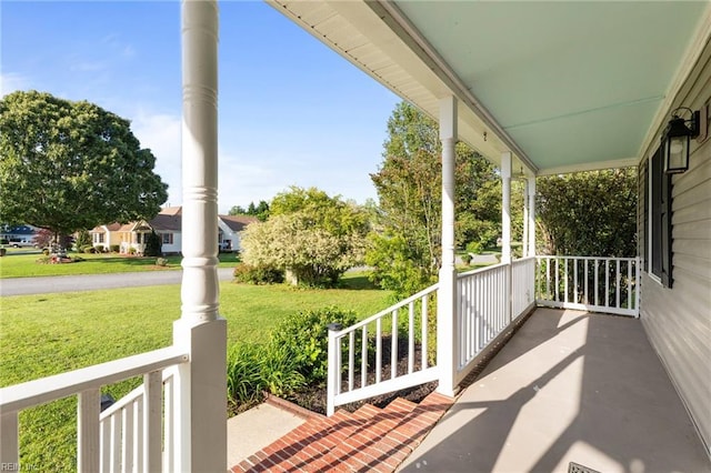 700 Canteberry Ln, Smithfield, VA 23430 - covered porch featuring a lawn