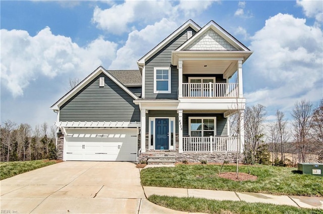 108 Brassy St, Suffolk, VA 23434 - craftsman house featuring a balcony, a porch, driveway, an attached garage, and stone siding