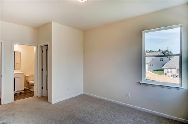 108 Brassy St, Suffolk, VA 23434 - unfurnished bedroom featuring carpet flooring, baseboards, and ensuite bath