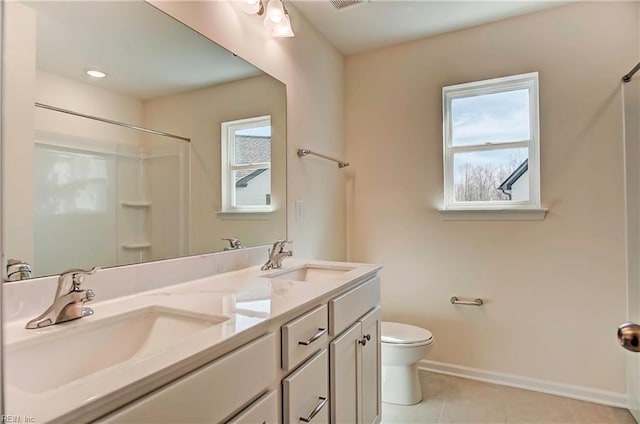 108 Brassy St, Suffolk, VA 23434 - full bathroom with toilet, tile patterned flooring, double vanity, a shower, and baseboards