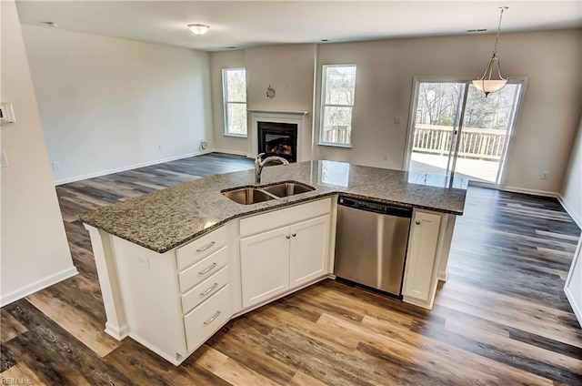 108 Brassy St, Suffolk, VA 23434 - kitchen with dishwasher, a sink, open floor plan, dark wood-style floors, and dark stone counters
