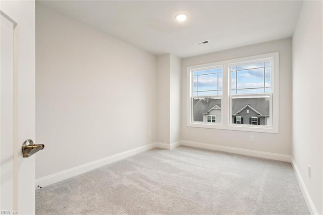 1544 Stanford Ln, Newport News, VA 23608 - unfurnished room featuring light colored carpet and baseboards
