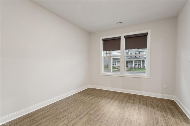 1544 Stanford Ln, Newport News, VA 23608 - unfurnished room with light wood-type flooring and baseboards