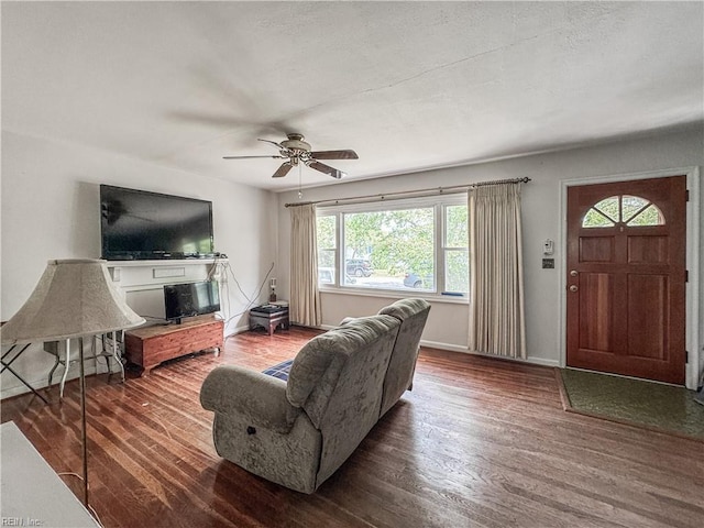 1625 Garfield Dr, Norfolk, VA 23503 - living room with wood finished floors, a ceiling fan, and baseboards