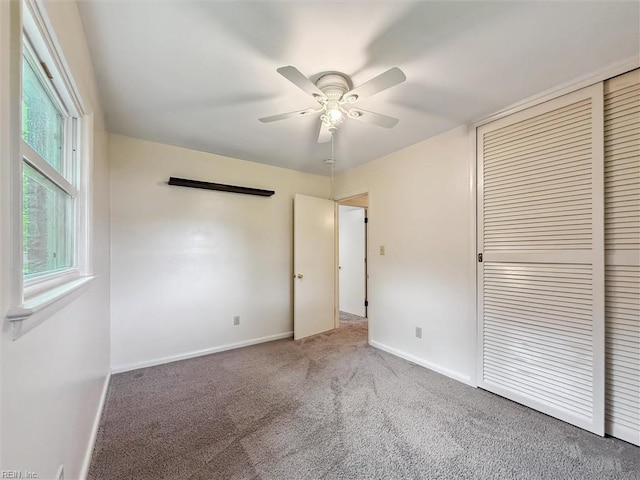 11 Redbud Ln, Newport News, VA 23602 - unfurnished bedroom featuring carpet flooring, a closet, baseboards, and ceiling fan
