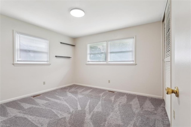 11 Redbud Ln, Newport News, VA 23602 - carpeted spare room with baseboards