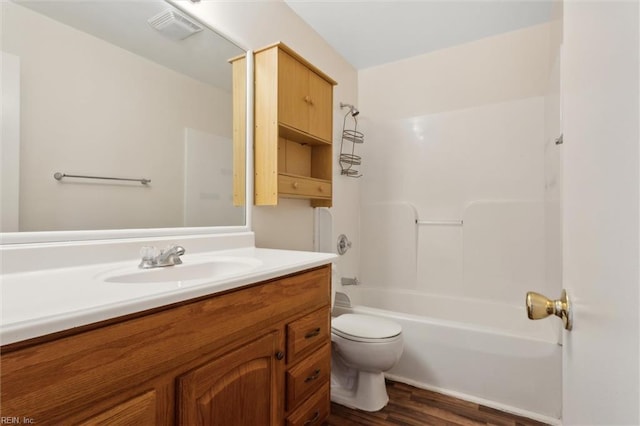 11 Redbud Ln, Newport News, VA 23602 - bathroom with toilet, vanity, wood finished floors, and bathtub / shower combination