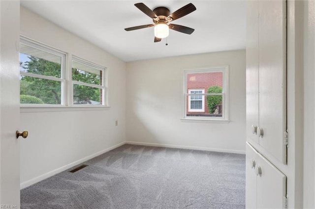 11 Redbud Ln, Newport News, VA 23602 - spare room with carpet, baseboards, and a ceiling fan