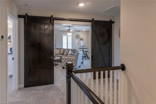 137 Preserve Way, Suffolk, VA 23434 - hall featuring a barn door and carpet flooring