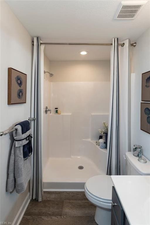 137 Preserve Way, Suffolk, VA 23434 - full bath featuring toilet, wood finished floors, vanity, a shower with shower curtain, and recessed lighting