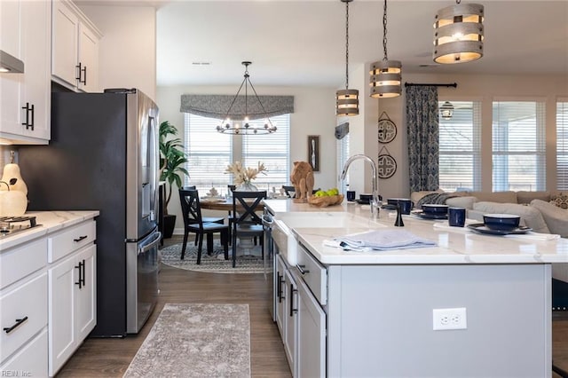 137 Preserve Way, Suffolk, VA 23434 - kitchen with a chandelier, white cabinets, dark wood-type flooring, and a sink