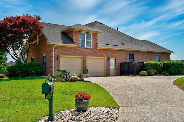 401 Muirfield, Smithfield, VA 23430 - view of front facade featuring brick siding, a garage, concrete driveway, a front lawn, and a shingled roof