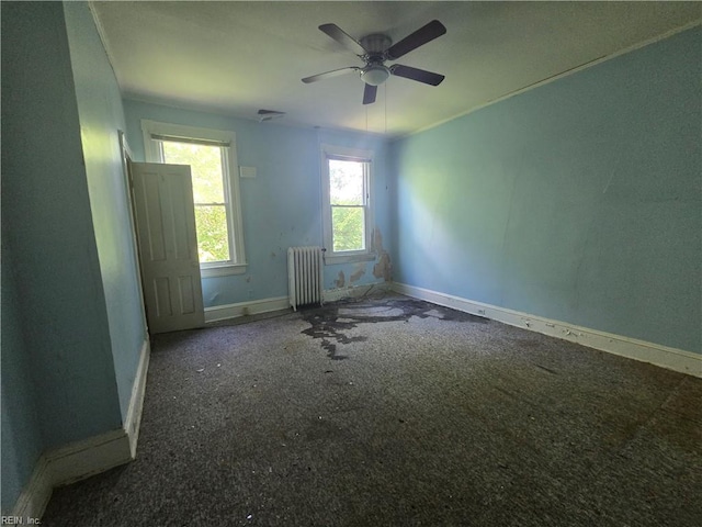 3222 Verdun Ave, Norfolk, VA 23509 - carpeted empty room featuring radiator heating unit, baseboards, and a ceiling fan
