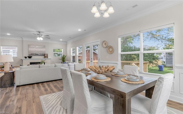 1608 Holland Ave, Norfolk, VA 23509 - dining room with plenty of natural light, ornamental molding, wood finished floors, a chandelier, and recessed lighting