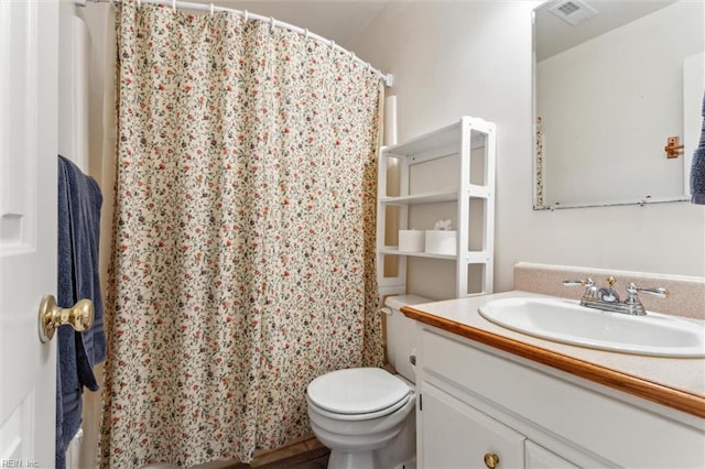 105 Stavenger Ct, Williamsburg, VA 23188 - bathroom with vanity, toilet, and curtained shower