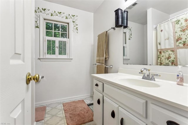 105 Stavenger Ct, Williamsburg, VA 23188 - bathroom featuring vanity and baseboards