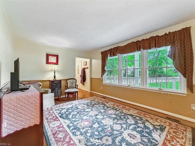 105 Stavenger Ct, Williamsburg, VA 23188 - bedroom with baseboards and wood finished floors