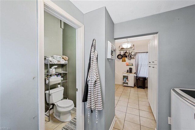 3317 Montana Ave, Norfolk, VA 23513 - bathroom with tile patterned flooring, toilet, and a chandelier