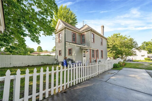 3317 Montana Ave, Norfolk, VA 23513 - victorian home featuring a chimney and central air condition unit