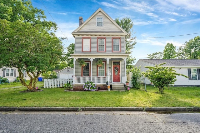3317 Montana Ave, Norfolk, VA 23513 - victorian house with covered porch and a chimney