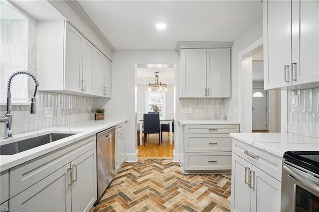 6223 Rolfe Ave, Norfolk, VA 23508 - kitchen featuring stainless steel dishwasher, a sink, decorative backsplash, recessed lighting, and brick floors