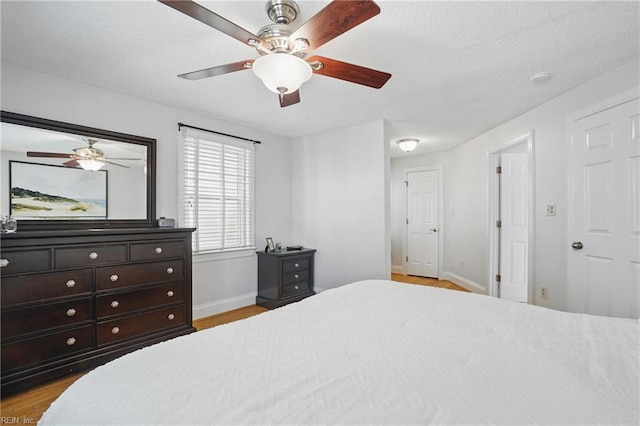 6223 Rolfe Ave, Norfolk, VA 23508 - bedroom with baseboards, light wood-style floors, and a ceiling fan