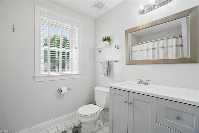 6223 Rolfe Ave, Norfolk, VA 23508 - bathroom featuring baseboards, vanity, toilet, and tile patterned flooring