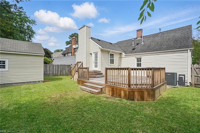 6223 Rolfe Ave, Norfolk, VA 23508 - back of property with a chimney, a deck, a shingled roof, and an outbuilding