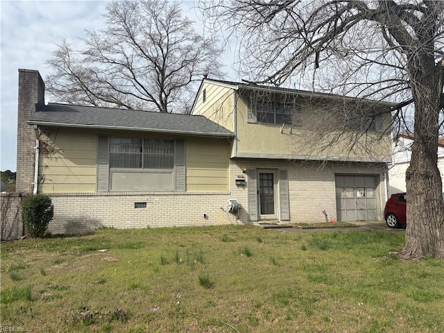 212 Breckinridge Ct, Hampton, VA 23666 - tri-level home featuring brick siding, a garage, a chimney, and a front yard