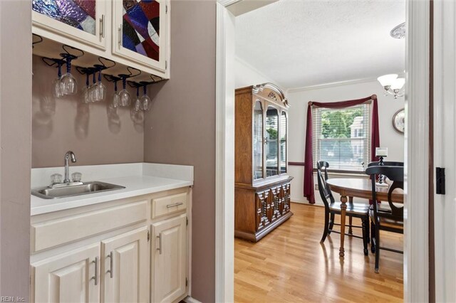 108 Silver Fox Trce, Yorktown, VA 23693 - kitchen with a sink, light wood-style flooring, and light countertops