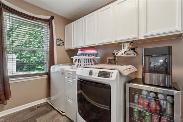 108 Silver Fox Trce, Yorktown, VA 23693 - washroom with washer and clothes dryer, cabinet space, wine cooler, wood finished floors, and baseboards