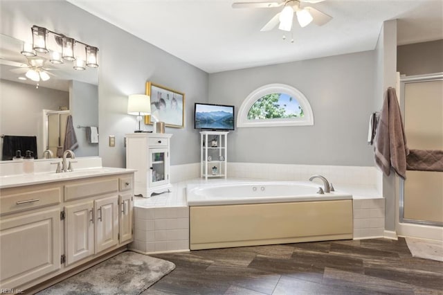 108 Silver Fox Trce, Yorktown, VA 23693 - bathroom featuring a ceiling fan, a shower stall, vanity, and a bath