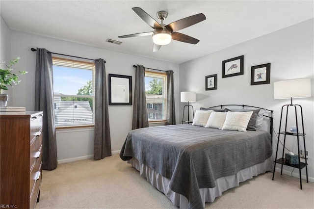 108 Silver Fox Trce, Yorktown, VA 23693 - bedroom with light carpet, baseboards, and ceiling fan