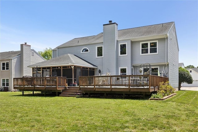 108 Silver Fox Trce, Yorktown, VA 23693 - back of house featuring a deck, a sunroom, and a lawn