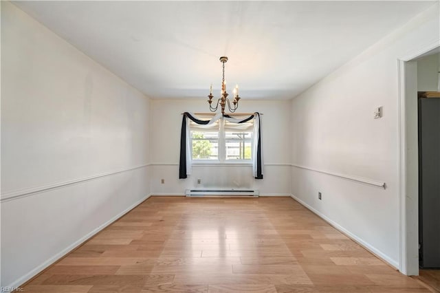 4456 Hudgins Dr, Virginia Beach, VA 23455 - spare room with a chandelier, light wood finished floors, baseboard heating, and baseboards