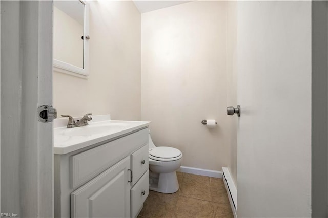 4456 Hudgins Dr, Virginia Beach, VA 23455 - bathroom featuring baseboard heating, vanity, toilet, baseboards, and tile patterned flooring