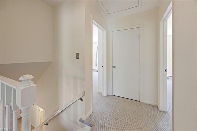 4456 Hudgins Dr, Virginia Beach, VA 23455 - hallway with an upstairs landing, light colored carpet, and baseboards