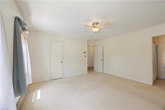 4456 Hudgins Dr, Virginia Beach, VA 23455 - unfurnished bedroom featuring light colored carpet, baseboards, and ceiling fan