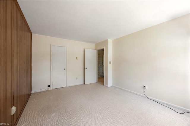 4456 Hudgins Dr, Virginia Beach, VA 23455 - unfurnished bedroom featuring light colored carpet and baseboards